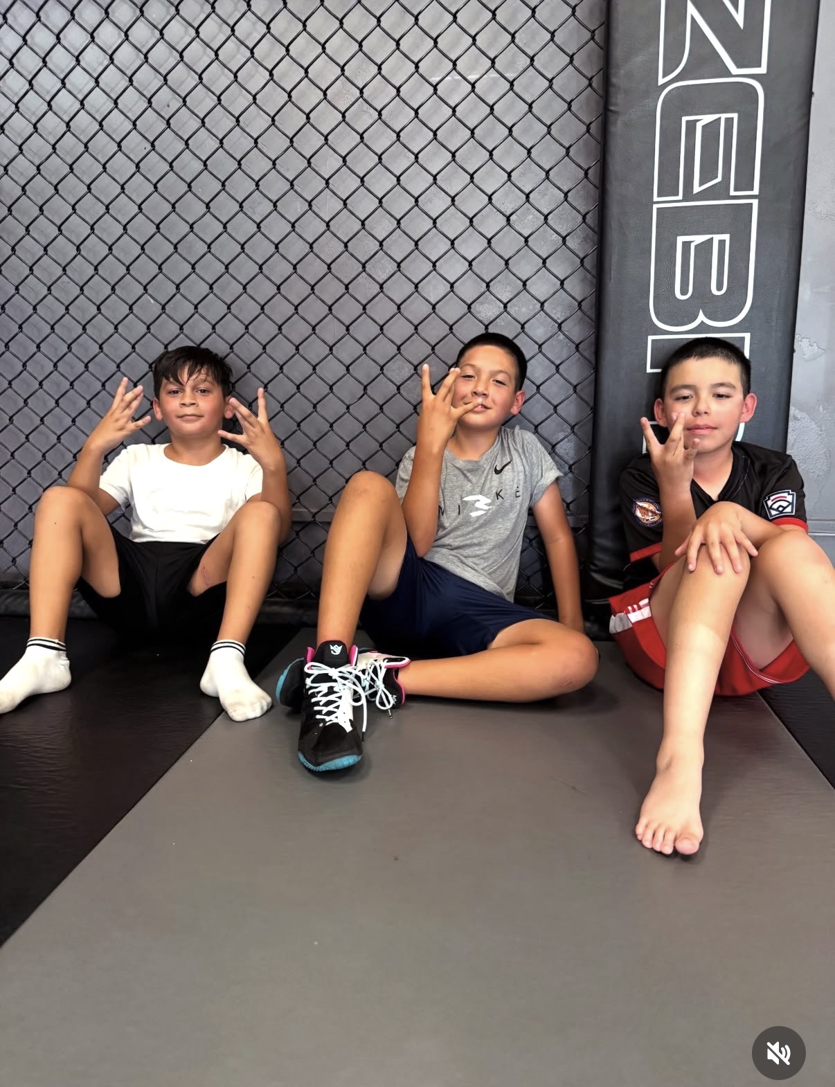 Young wrestlers in a West Coast Athletics youth class