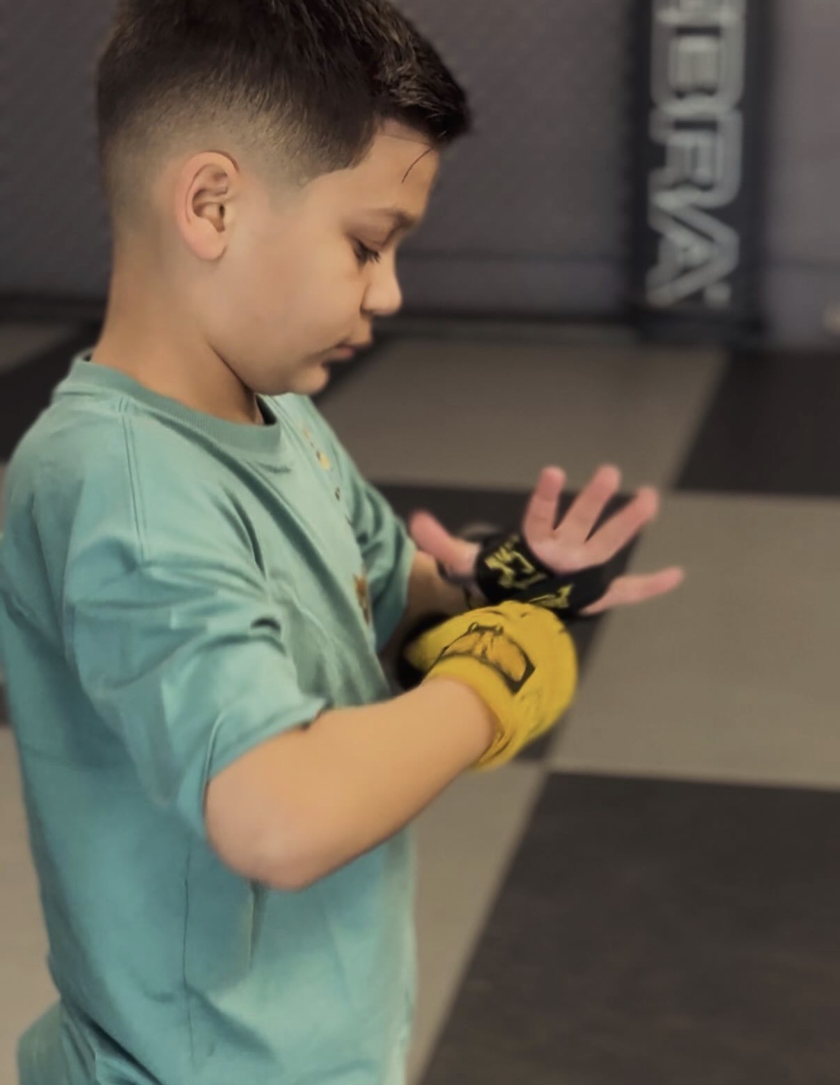 Hand-wrapping in youth martial arts